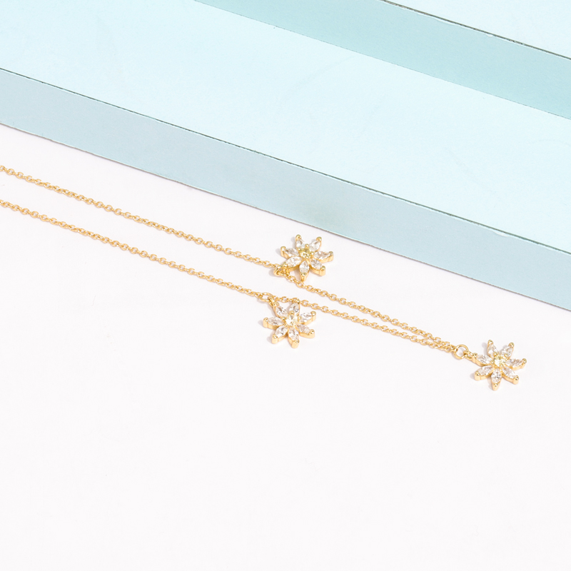 gold flower charm necklace