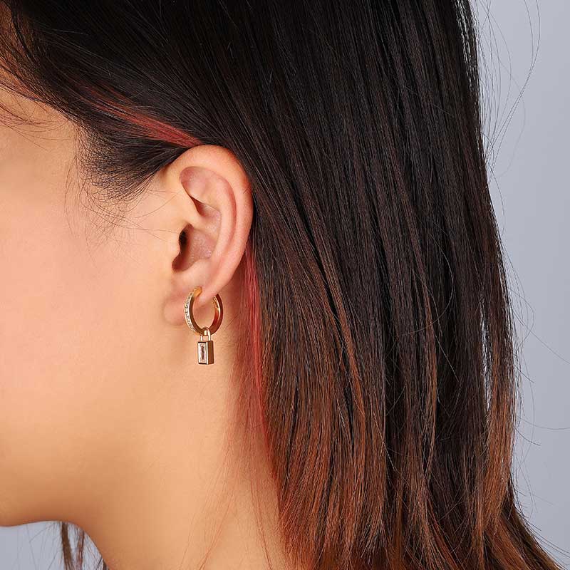 gold hoop earrings with charm