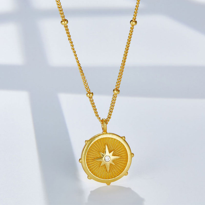 gold chain with disc pendant